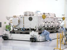Kibo's external experiment platform is moved in the processing facility.
