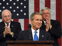 President Bush reacts to applause while delivering his State of the Union address