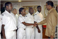 Jagdeo shakes sailor’s hand, others wait (U.S. Navy)