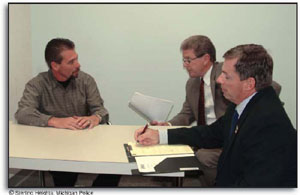 Two officers conducting an interview