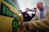 Secretary Bodman (right), Indiana Governor Mitch Daniels (left), and John Larson of General Motors (right) 