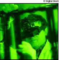 Photograph  of man looking through goggles