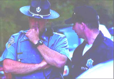 Photograph of two police officers in discussion