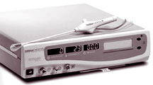 Picture of the Gynecare System,  a balloon attached to a catheter, which is connected to a small metal controller console.
