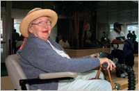 older woman in motorized chair