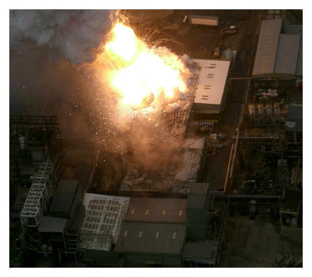 Photograph of flames engulfing part of the Texas facility.