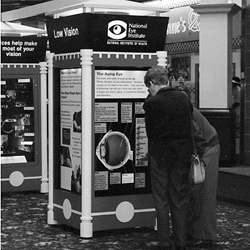 People viewing a kiosk at the Birmingham mall.