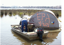 Image of EPA assessing tank found in water