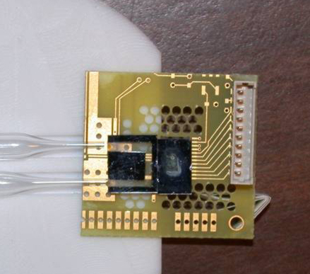 Image of 'NMR on a Chip' featuring NIST's Magnetic Mini-Sensor