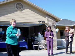 Connie Hogland, HUD's Idaho Field Office director; Shawna Lown, SICHA; and Kelly Hynes, homeowner.