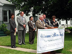 Picture of Iowa Lt. Governor Pederson, Dan Nicholson, Michael Liu and Cindy Fruest listen to Mike Tramontina speaking.