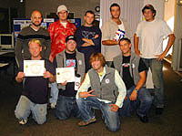 Several participants in ESD 101's Youthbuild Spokane and Spokane Service Team celebrate their recent graduation: Kneeling in front, from left, are Noah McNutt, Jeff Cochran, Jason Overdorff and Rodney Bocook. Standing in back, from left, are Matt Bentz, Gene Poe, Tim Northington, William (Striker) Jackson and Eric Sommerfeld.