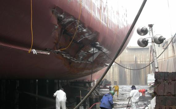 Figure 5. Damage to the starboard side of the New Delhi Express. The impact with the submerged ledge breached an empty heavy fuel oil tank and a water ballast tank. No oil was released into the water. Repairs cost an estimated $1.5 million and required about 52 tons of steel.