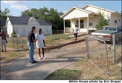 After helping build a house for Habitat for Humanity, President Bush meets some of his Waco neighbors. White House Photo by Eric Draper.