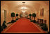 Topiary trees line the hallway of the Ground Floor of the White House residence.