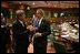 President George W. Bush speaks with European Union President Jean-Claude Juncker after a meeting Tuesday, Feb. 22, 2005, with EU Leaders in Brussels.