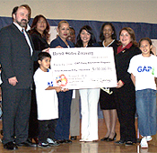 Picture of Linda presenting check to GAP.