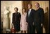 President George W. Bush and first lady Laura Bush are welcomed by King Albert II and Queen Paolo of Belgium at the palace office in Brussels, Monday, Feb. 21, 2005.