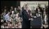 President Bush smiles broadly while addressing troops Wednesday, Feb. 24, 2005, at Wiesbaden Army Air Field in Wiesbaden, Germany.