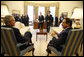 President George W. Bush speaks with King Hamad Bin Isa Bin Salman Al-Khalifa of Bahrain during their meeting Tuesday, March 25, 2008, in the Oval Office at the White House. White House photo by Eric Draper