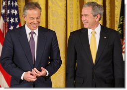 President George W. Bush stands with former Prime Minister Tony Blair of the United Kingdom as they listen to a citation honoring Mr. Blair as recipient of the 2009 Presidential Medal of Freedom. The presentation, held Tuesday, Jan. 13, 2009, in the East Room of the White House, will be the last such presentation by President Bush during his administration. White House photo by Chris Greenberg