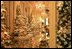 Christmas trees line the Cross Hall for the 2004 Christmas season at the White House.