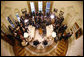 President George W. Bush welcomes Mexico's President Felipe Calderon to the Oval Office at the White House, seen in this remote camera view, Tuesday, Jan. 13, 2008, during their joint press availability. White House photo by Eric Draper