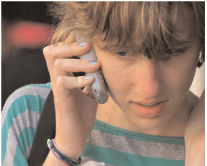 teenager using a cell phone