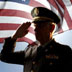 A veteran salutes the flag
