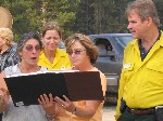 Former Atlanta IC Joe Ferguson with residents of Secesh, Idaho.