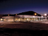 [Image: Night view of New Hope Center]