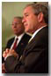 President George W. Bush with Secretary of State Colin Powell at a photo opp on Monday June 18, 2001 in the Oval Office. White House Photo by Susan Sterner.