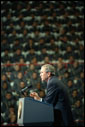 Addressing cadets and staff, President George W. Bush explained America's plans in the war against terrorism during the ceremony for the George C. Marshall ROTC Award Seminar on National Security at Cameron Hall at the Virginia Military Institute in Lexington, Va., Wednesday, April 17. "We know that true peace will only be achieved when we give the Afghan people the means to achieve their own aspirations," said President Bush. White House photo by Tina Hager.