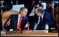 President George W. Bush talks with French President Jacques Chirac at the start of the G8 leaders' working session in Kananaskis, Canada, Thursday, June 27.  