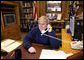 President George W. Bush talks to military personnel from Camp David, Thanksgiving Day, Thursday, Nov. 27, 2008. The President called members of the Armed Forces stationed in remote locations worldwide to wish them a happy Thanksgiving and thank them for their service to our nation. White House photo by Eric Draper