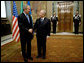 President George W. Bush is greeted upon his arrival to Quirinale Palace by Italy's President Carlo Ciampi Thursday, April 7, 2005. President Bush made the courtesy call while in Rome for the Friday funeral of Pope John Paul II.  White House photo by Eric Draper