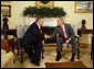 President George W. Bush shakes hands with Jalal Talabani, President of Iraq, during a meeting Wednesday, June 25, 2008, in the Oval Office at the White House. President Bush said, "It's been my honor to welcome a friend, President Talabani, back to the Oval Office. He is the President of a free Iraq. He is a man who's been on the front lines of helping to unify Iraq and to help Iraq recover from a brutal regime -- that of Saddam Hussein."  White House photo by Eric Draper