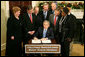 President George W. Bush signs into law H.R. 3648, the Mortgage Forgiveness Debt Relief Act of 2007, during ceremonies Thursday, Dec. 20, 2007, in the Roosevelt Room of the White House. White House photo by Eric Draper