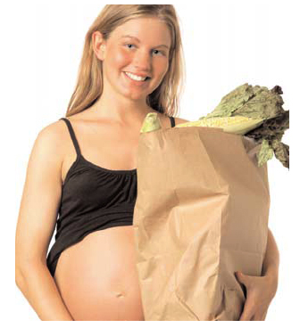 pregnant woman with groceries