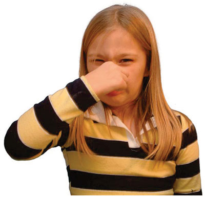 girl holding her nose