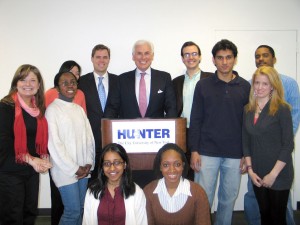 MCC CEO Ambassador John Danilovich poses with students at Hunter College in New York City.