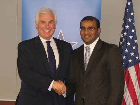 MCC CEO Ambassador John Danilovich shakes hands with Bharrat Jagdeo, the President of Guyana