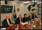 President George W. Bush meets with his economic advisors Thursday, Oct. 11, 2007, in the New Executive Office Building in Washington, D.C. "The deficit today is at 1.2 percent of GDP, which is lower than the average of the last 40 years. In other words, we have told the American people that by keeping taxes low we can grow the economy, and by working with Congress to set priorities we can be fiscally responsible and we can head toward balance," said President Bush in a statement to the press. "And that's exactly where we're headed." White House photo by Chris Greenberg