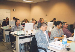 Picture of an FVS training class in progress showing students working with FVS exercises on their PCs.