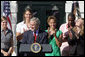 President George W. Bush addresses the NCAA 2006 and 2007 championship Teams during a ceremony Friday, Sept. 21, 2007, on the South Lawn. White House photo by Chris Greenberg