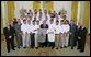 President George W. Bush stands with members of Oregon State University Baseball Team Championship Team Friday, Sept. 21, 2007, at the White House during a photo opportunity with the 2006 and 2007 NCAA Sports Champions. White House photo by Eric Draper