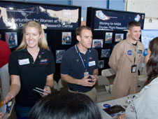 NASA Dryden structures engineer Kia Davidson and operations engineers Ryan Lefkofsky and Mike Holtz explain their jobs at NASA Dryden to high school students attending the annual Salute to Youth career day.