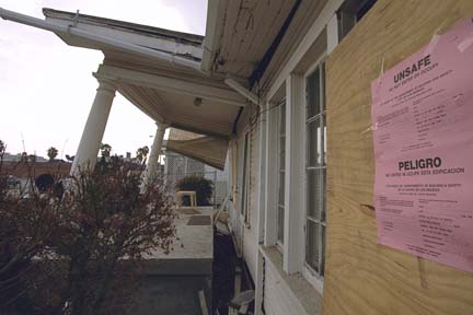Photo of a home damaged by an earthquake.
