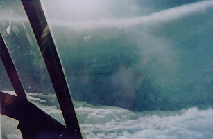 The WC-130 Hurricane Hunter plane in the midst of a hurricane