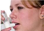 person with inhaler